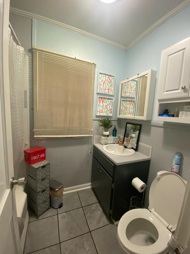 bathroom featuring vanity, ornamental molding, curtained shower, tile patterned floors, and toilet