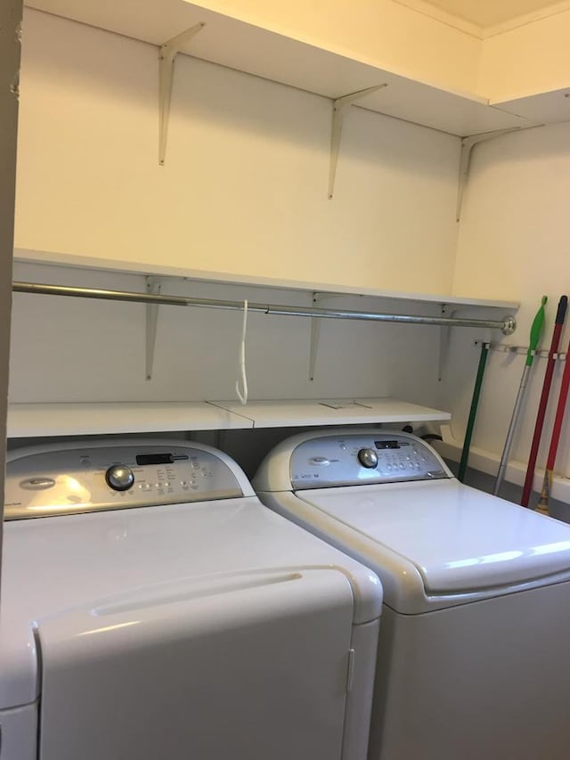 laundry room with independent washer and dryer and laundry area