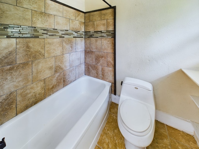 bathroom with toilet and a bathing tub