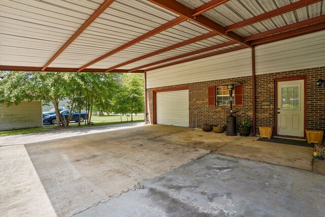 568 N Morris St, Slocomb, AL 36375 - garage with a carport and concrete driveway