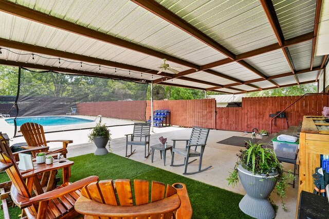 568 N Morris St, Slocomb, AL 36375 - fenced backyard featuring a patio area and ceiling fan