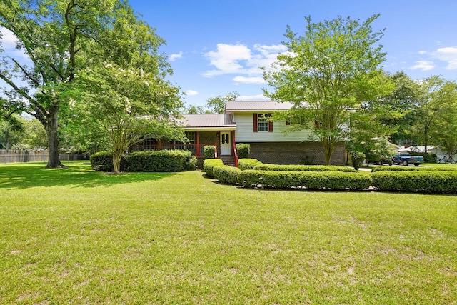 568 N Morris St, Slocomb, AL 36375 - split level home featuring metal roof