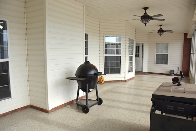 view of patio / terrace with grilling area and ceiling fan