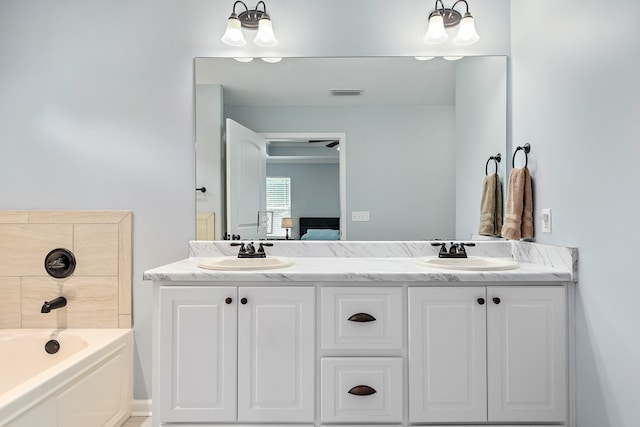 522 Birchwood Ln, Dothan, AL 36301 - full bath with double vanity, a bath, and ensuite bathroom