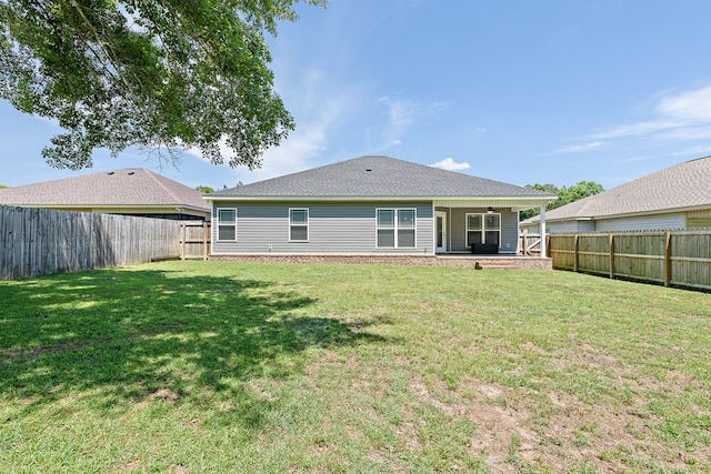 522 Birchwood Ln, Dothan, AL 36301 - back of property with ceiling fan and a shingled roof