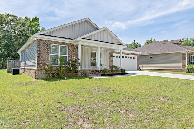 522 Birchwood Ln, Dothan, AL 36301 - craftsman house featuring a porch, brick siding, and board and batten siding