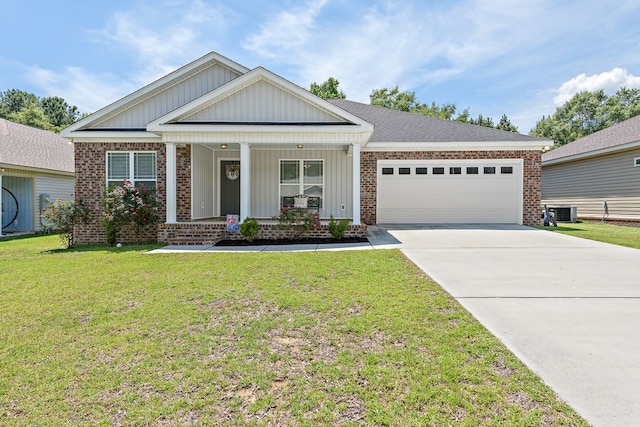 522 Birchwood Ln, Dothan, AL 36301 - view of front of home with brick siding, an attached garage, board and batten siding, and concrete driveway