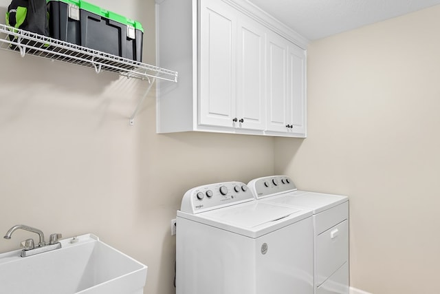 522 Birchwood Ln, Dothan, AL 36301 - washroom featuring washing machine and clothes dryer and cabinet space