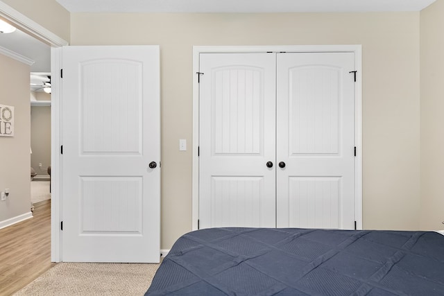 522 Birchwood Ln, Dothan, AL 36301 - bedroom featuring a closet, baseboards, and light wood finished floors