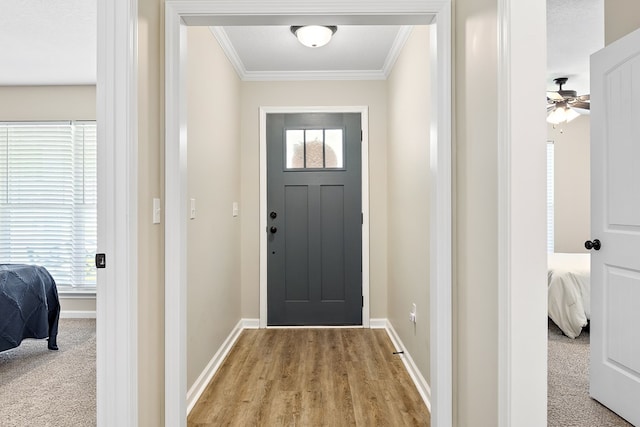522 Birchwood Ln, Dothan, AL 36301 - entryway featuring crown molding, baseboards, and light wood-style floors