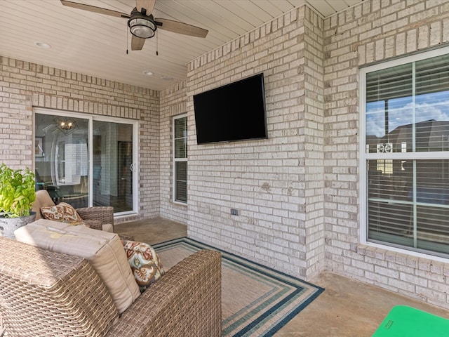 view of patio / terrace featuring ceiling fan