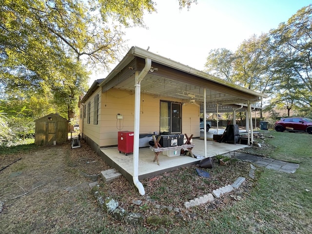 exterior space with a shed