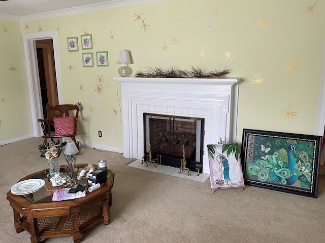 carpeted living room with a tiled fireplace and crown molding