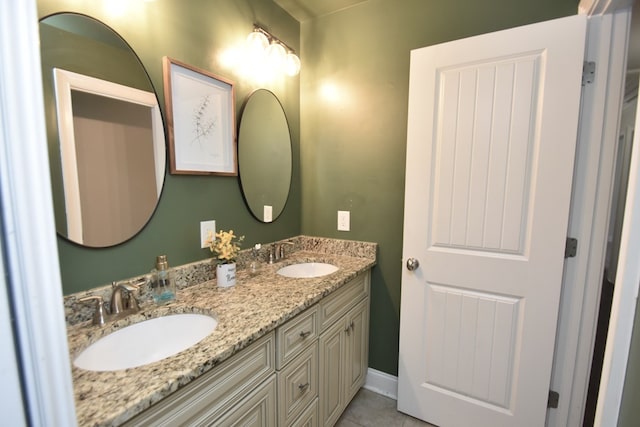 bathroom featuring vanity and tile patterned flooring