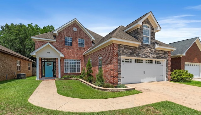 front facade with a garage and a front lawn