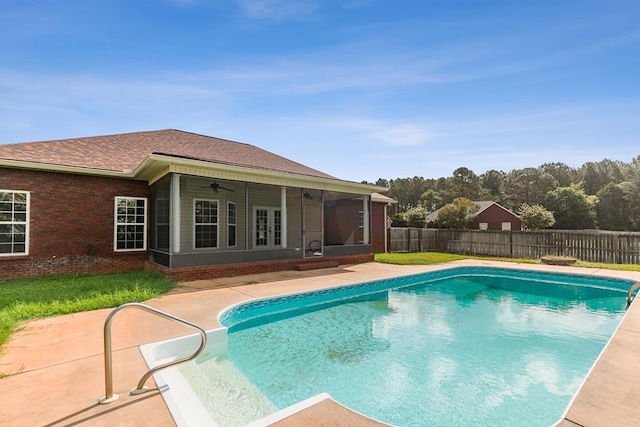 170 County Road 751, Enterprise, AL 36330 - view of swimming pool featuring a ceiling fan, a patio area, and a sunroom