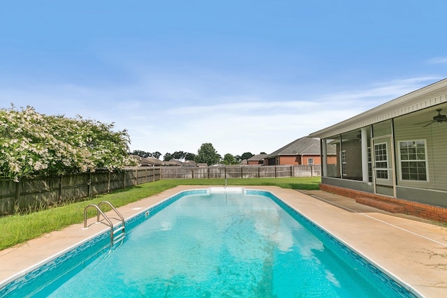 170 County Road 751, Enterprise, AL 36330 - view of pool with a fenced backyard, a sunroom, a patio area, and a ceiling fan