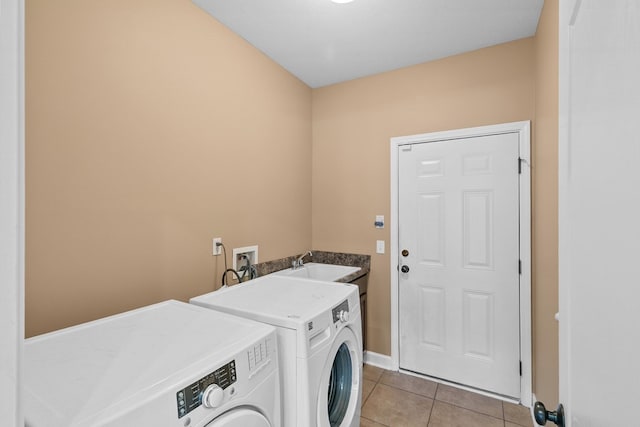170 County Road 751, Enterprise, AL 36330 - washroom with washing machine and dryer and light tile patterned flooring
