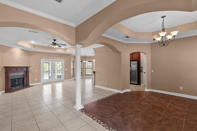 170 County Road 751, Enterprise, AL 36330 - unfurnished living room featuring a raised ceiling, a chandelier, ceiling fan, and crown molding