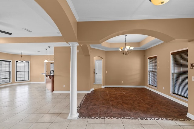 170 County Road 751, Enterprise, AL 36330 - spare room with light tile patterned flooring, crown molding, a chandelier, a tray ceiling, and arched walkways