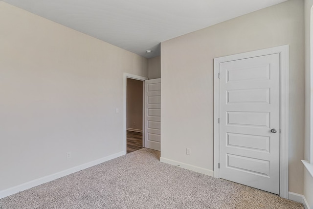 unfurnished bedroom featuring carpet