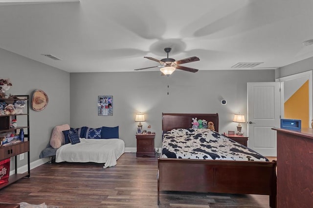 bedroom with ceiling fan and dark hardwood / wood-style flooring