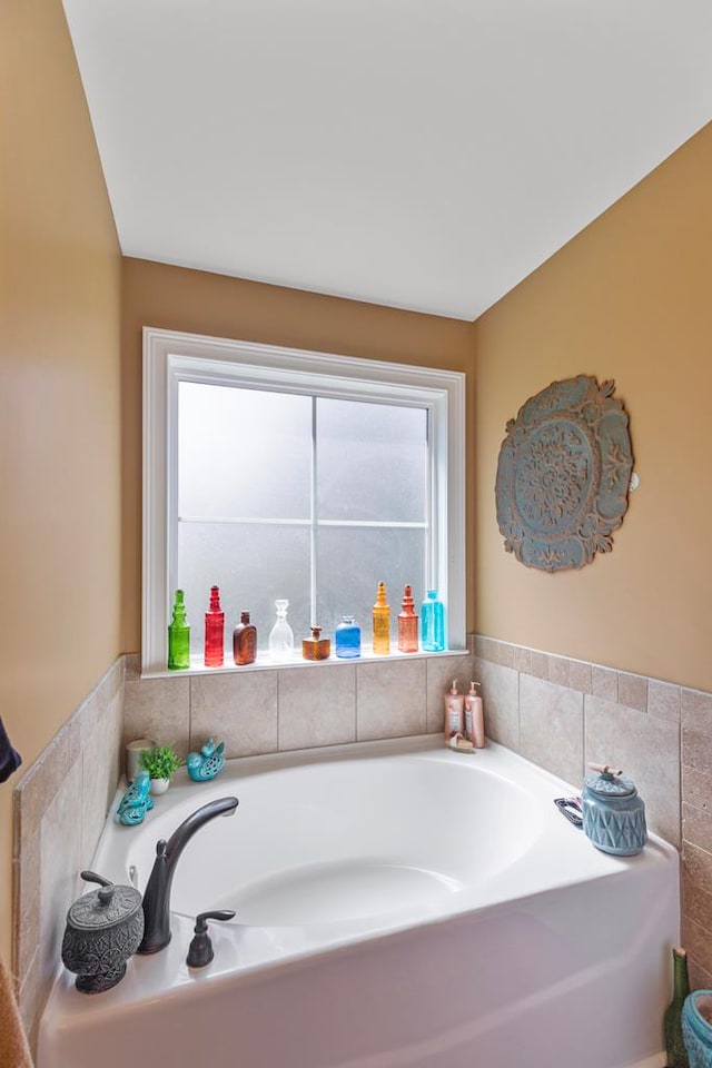 bathroom featuring a tub