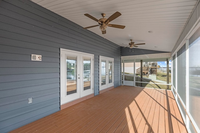 unfurnished sunroom featuring vaulted ceiling, ceiling fan, and wood ceiling