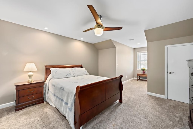 bedroom featuring ceiling fan and light colored carpet