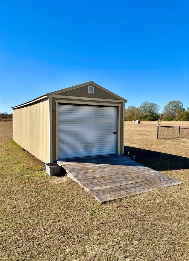 garage with a yard