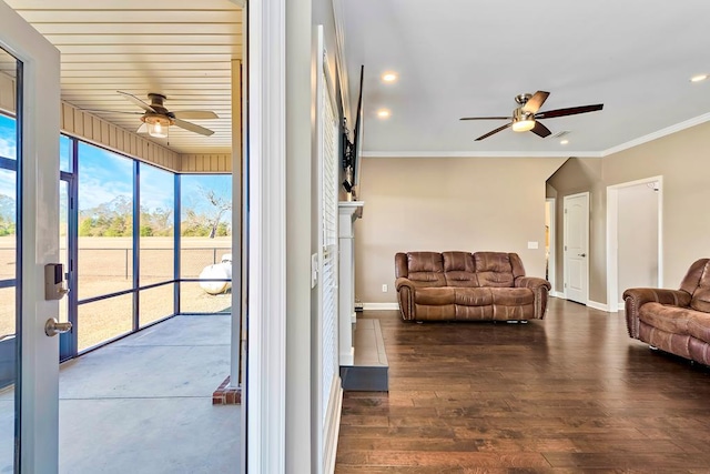 interior space with crown molding, ceiling fan, and dark hardwood / wood-style floors