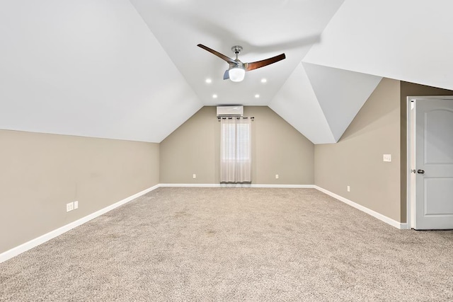 bonus room featuring a wall unit AC, ceiling fan, carpet flooring, and lofted ceiling