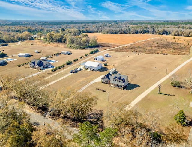 birds eye view of property with a rural view