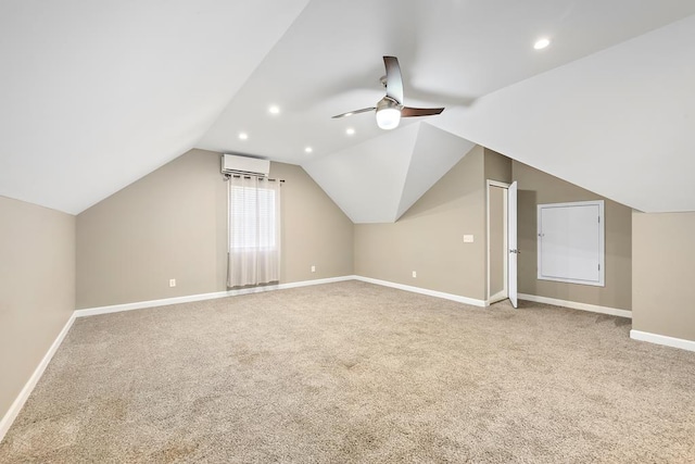 additional living space featuring a wall mounted air conditioner, carpet floors, ceiling fan, and lofted ceiling