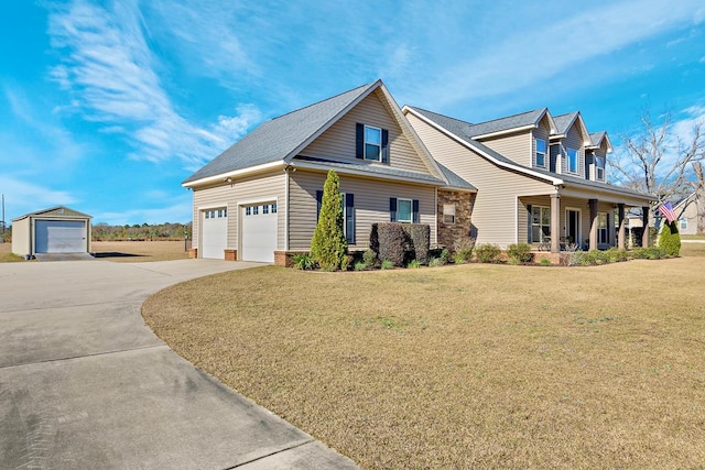 cape cod house featuring a front lawn and covered porch