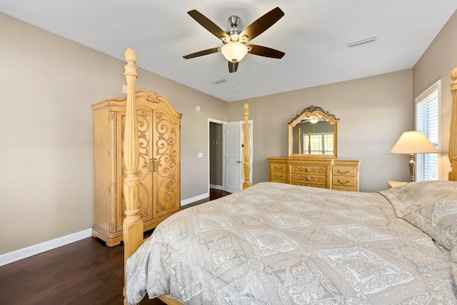 bedroom featuring ceiling fan and dark hardwood / wood-style floors