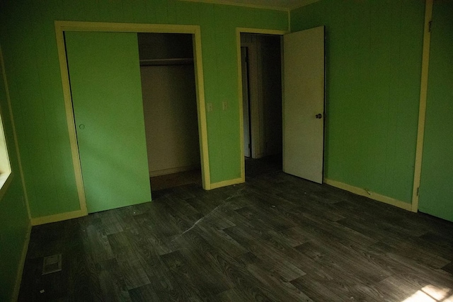 5131 County Rd 417, Kinston, AL 36453 - unfurnished bedroom with dark wood finished floors and a closet