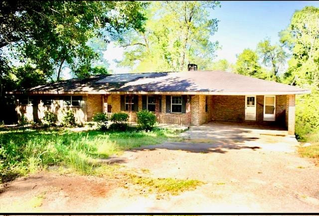 5131 County Rd 417, Kinston, AL 36453 - ranch-style house featuring asphalt driveway and a carport