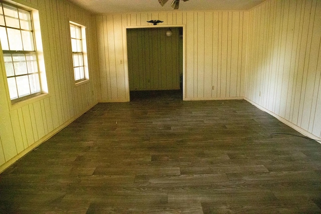 5131 County Rd 417, Kinston, AL 36453 - unfurnished room featuring dark wood-type flooring and wood walls