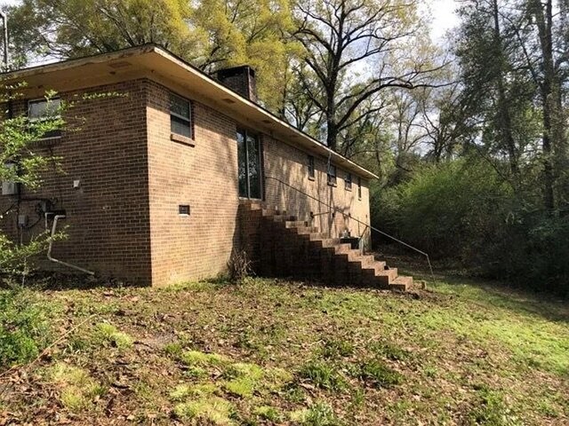 5131 County Rd 417, Kinston, AL 36453 - view of side of property featuring brick siding