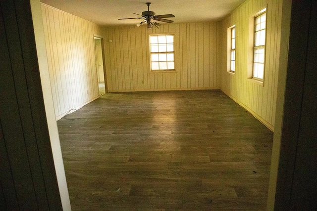 5131 County Rd 417, Kinston, AL 36453 - empty room with wood finished floors, a ceiling fan, and baseboards