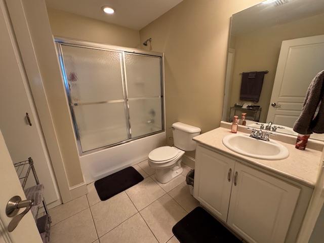 208 Craftsman Dr, Dothan, AL 36303 - full bathroom with vanity, tile patterned floors, shower / bath combination with glass door, and recessed lighting