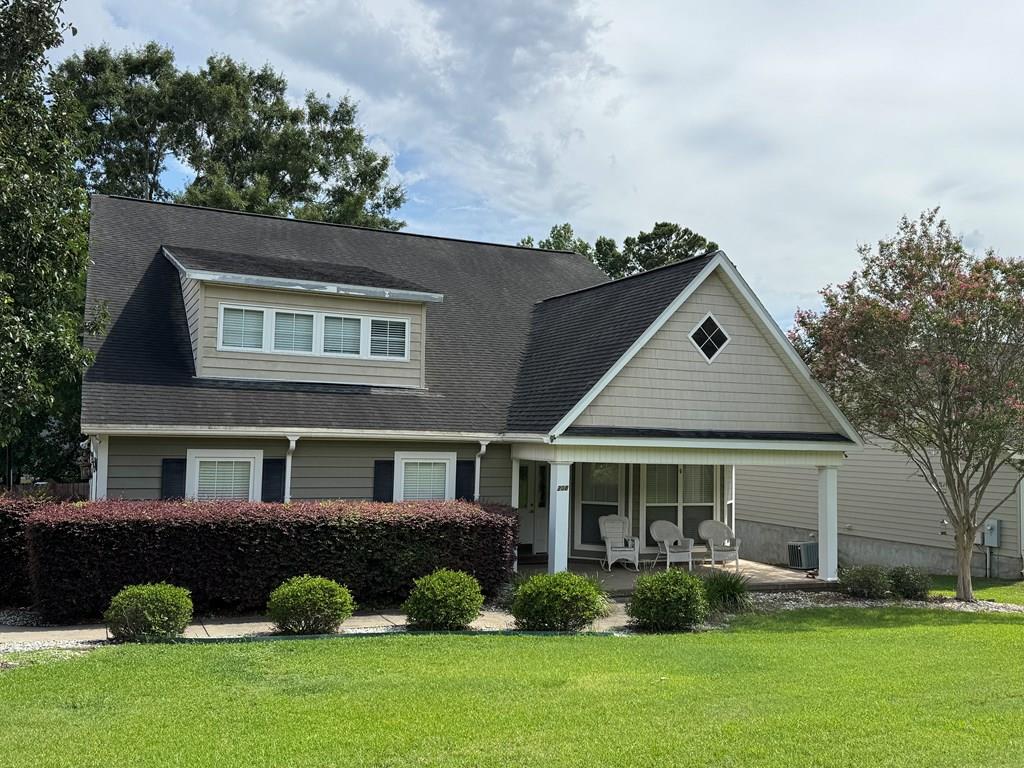 208 Craftsman Dr, Dothan, AL 36303 - view of front of property featuring covered porch and a front yard
