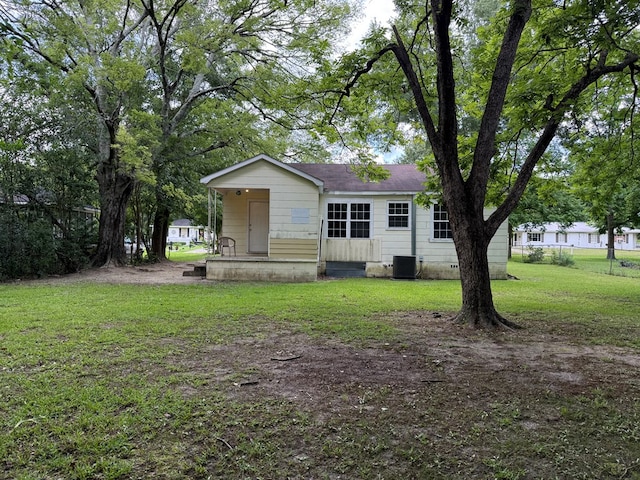 1028 S Bell St, Dothan, AL 36301 - view of front of home with a front lawn, central air condition unit, and crawl space