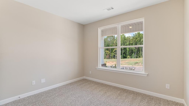 310 Heritage Way, Headland, AL 36345 - empty room with carpet floors, visible vents, and baseboards