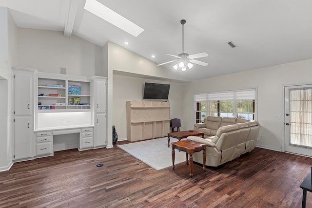 living room featuring high vaulted ceiling, beam ceiling, a skylight, dark hardwood / wood-style flooring, and ceiling fan