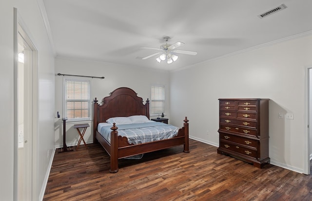 bedroom with dark wood-type flooring, ceiling fan, and ornamental molding