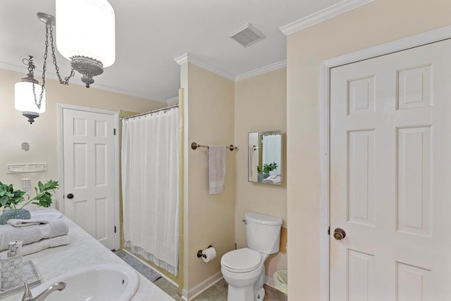 bathroom with tile patterned floors, crown molding, vanity, and toilet