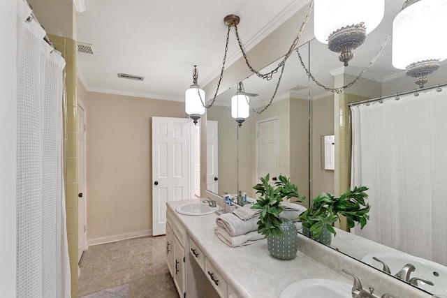 bathroom featuring vanity and crown molding