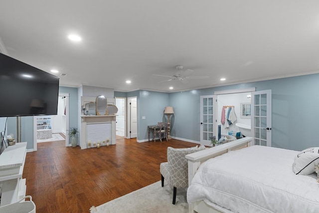 bedroom featuring french doors, dark hardwood / wood-style floors, and ceiling fan